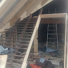 <p>The new roof is built over the top of the existing one.</p>