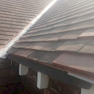 <p>Open rafter detail as existing . Good tiles re-used on front elevation so the new roof blends in as much as possible.</p>