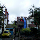 <p>The first day of mixed weather but the roof is on and  the window is on its way.</p>